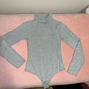 GREY LONG SLEEVE TURTLE NECK BODYSUIT